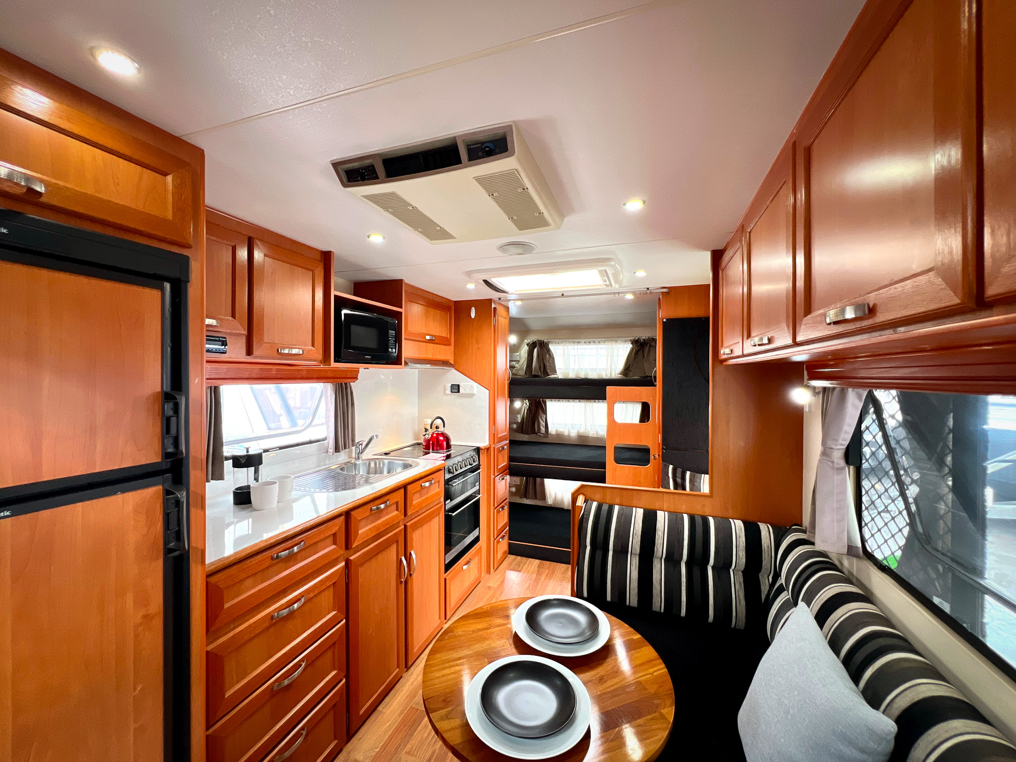 2012-concept-benson-650-07-interior-lounge-to-bunks
